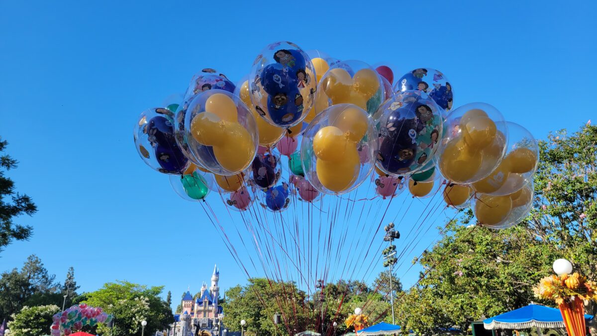 Disneyland balloons with the Castle in the background